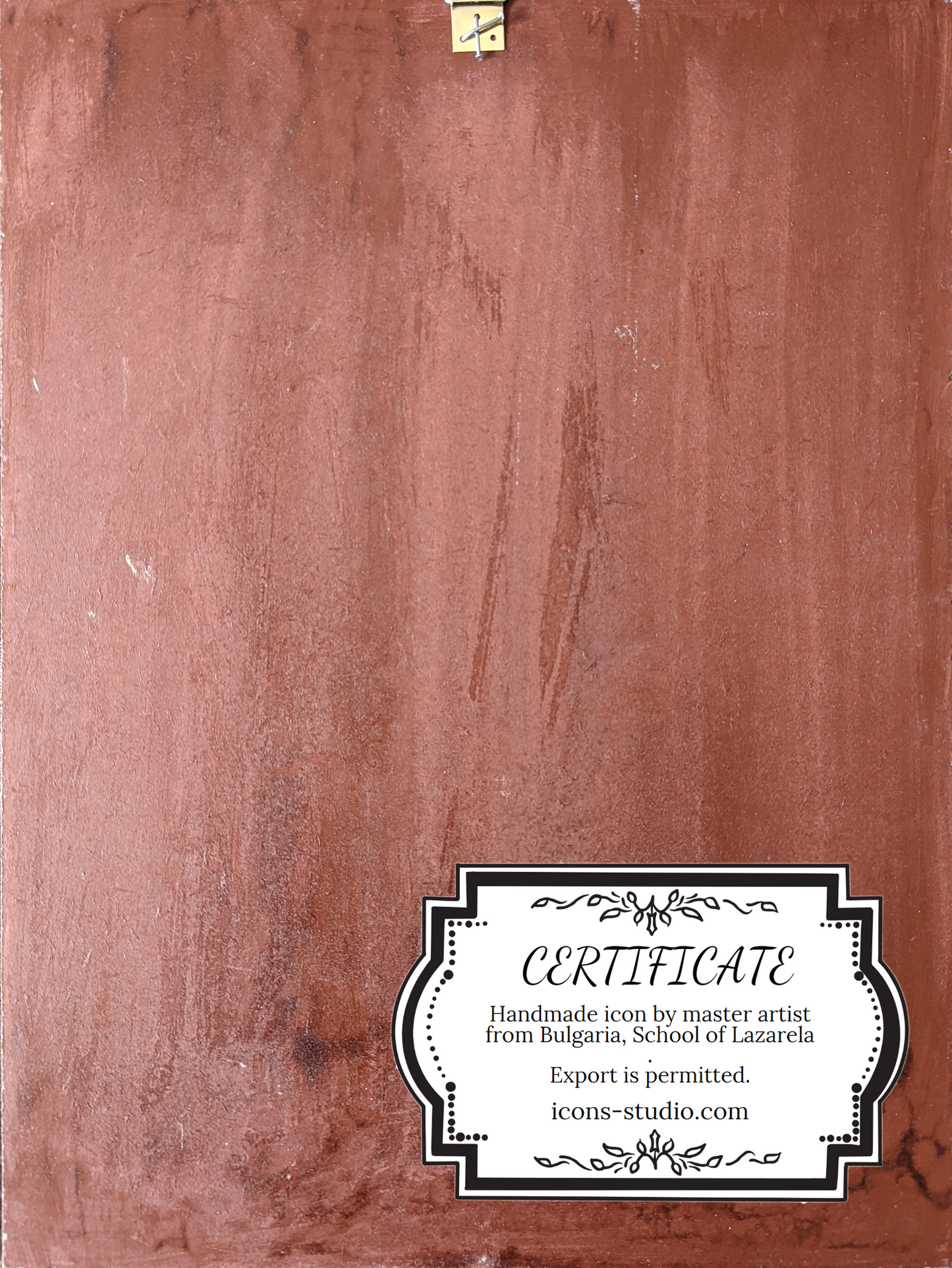 Back side of the wooden Orthodox icon board with visible natural wood grain and wall-mounting slot.