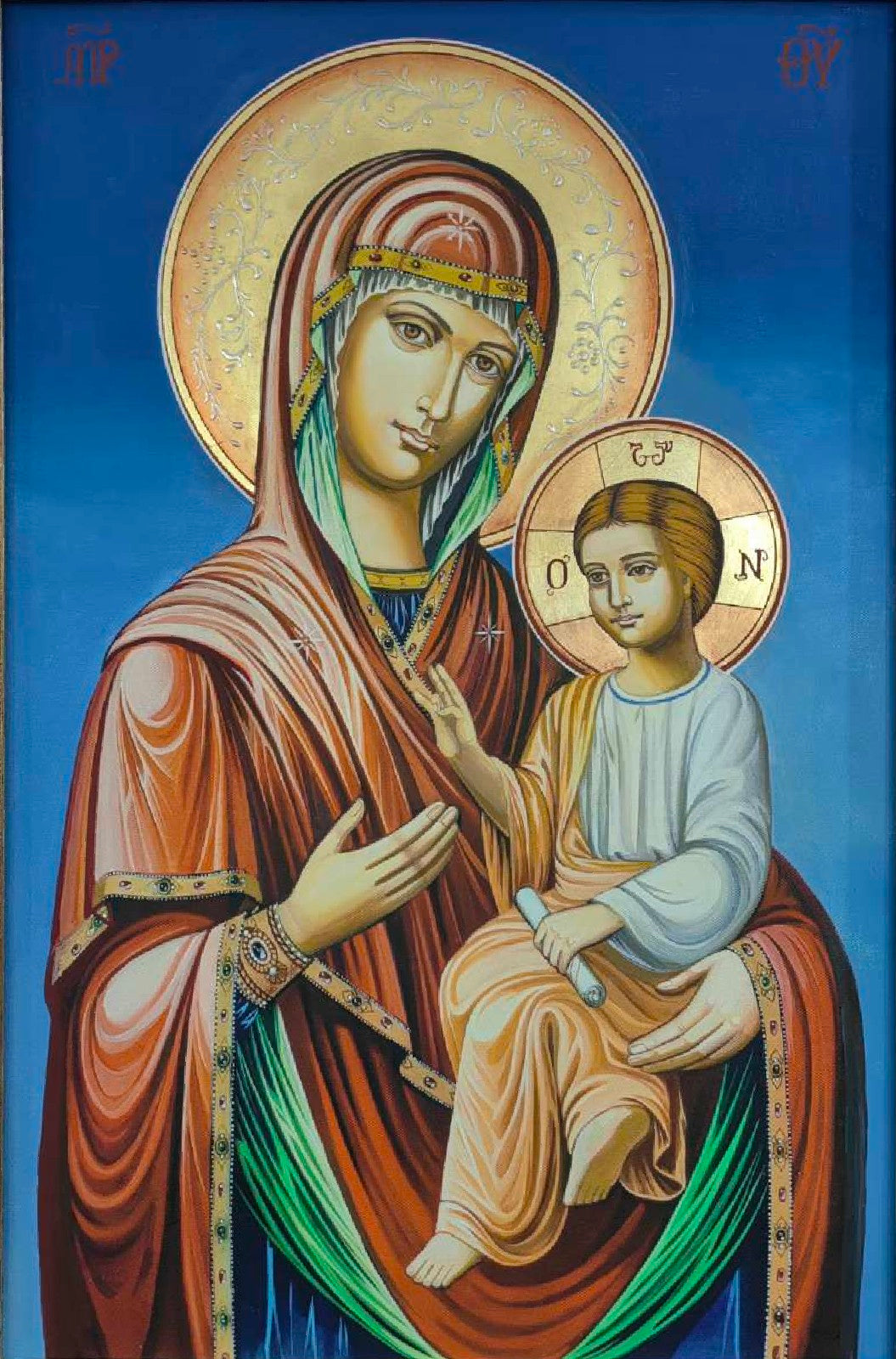Orthodox icon of the Theotokos Skoroposlushnitsa holding Christ, hand-painted with gold leaf and traditional ornamentation.