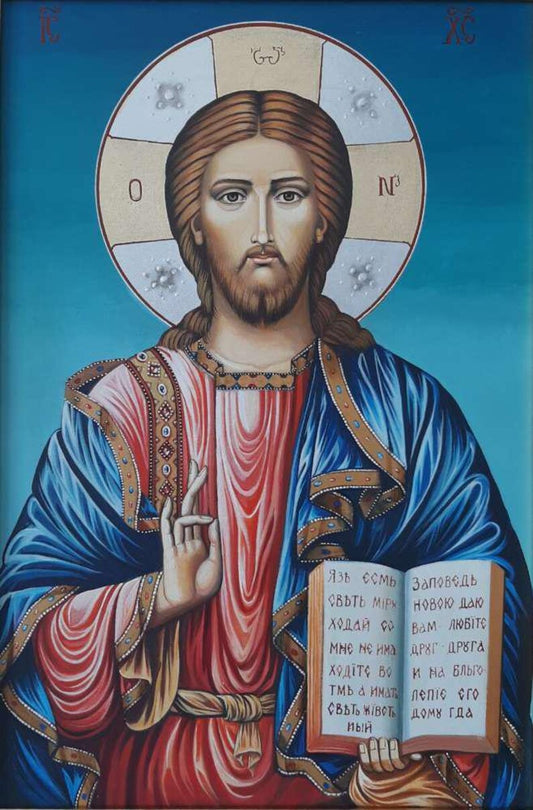 Hand-painted Orthodox icon of Christ Pantocrator with gold leaf on wood panel